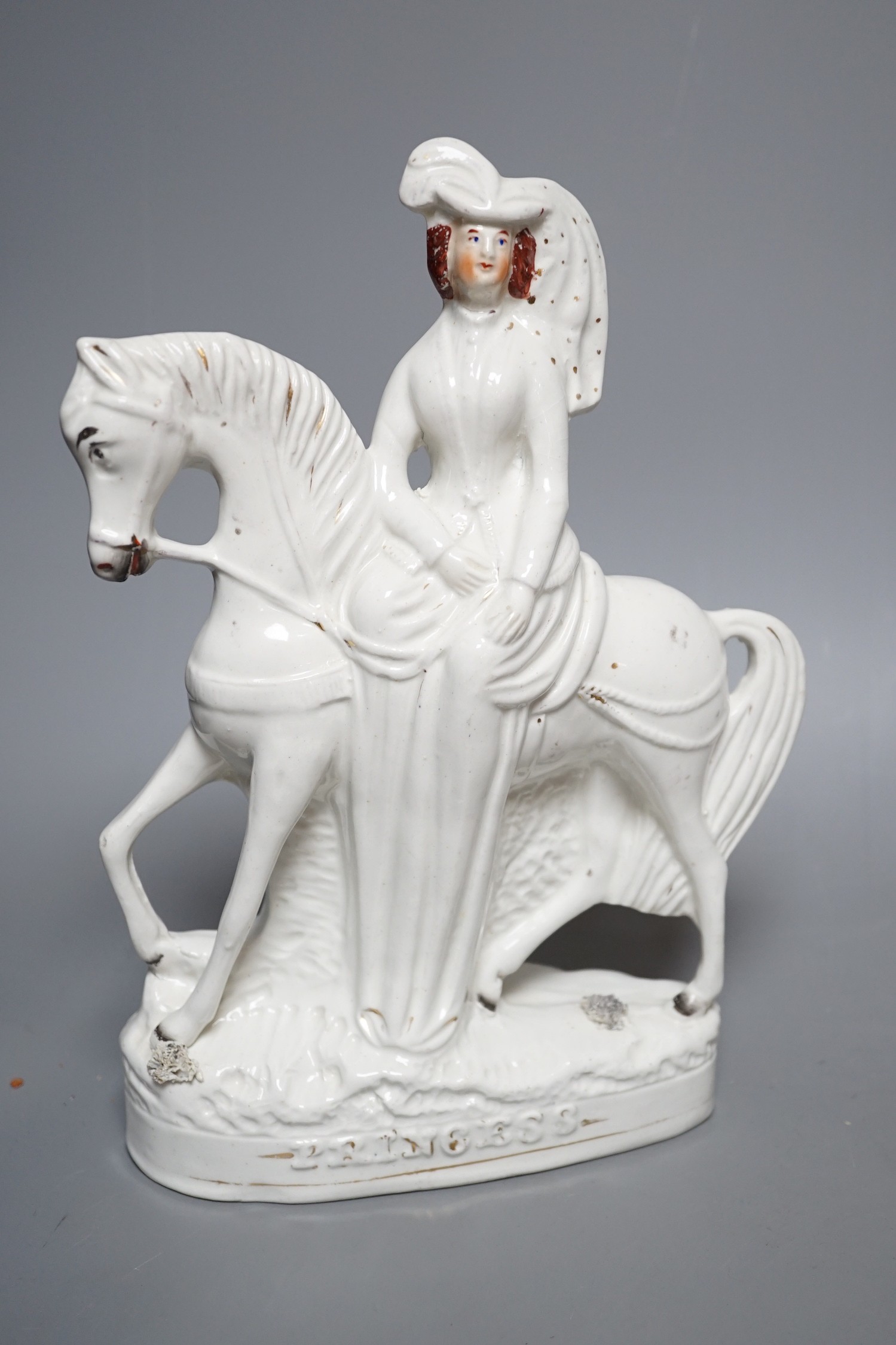 A Wedgwood glazed black basalt bust of Shakespeare, two Victorian Staffordshire figures and a cow creamer, tallest 27cm